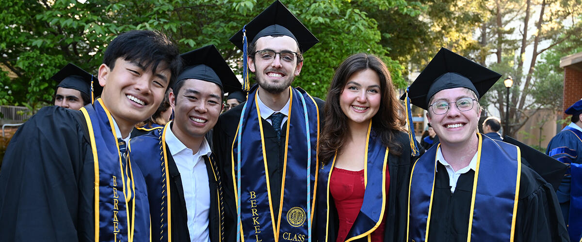 Happy smiling grads at 2025 Commencement