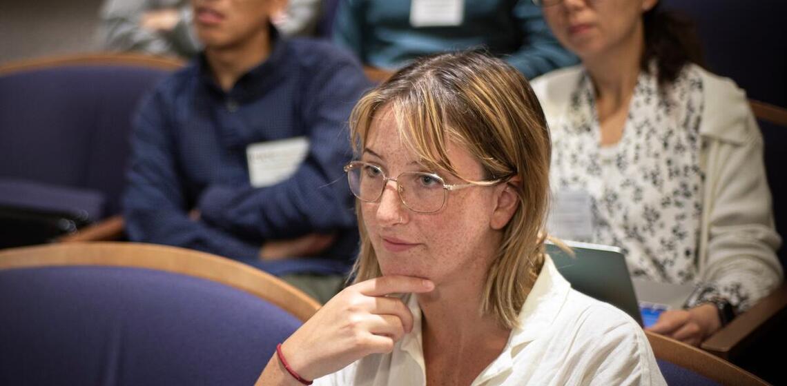 Woman looking interested at lecture