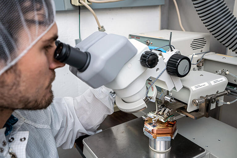 Roger Romani examines a TESSERACT sensor